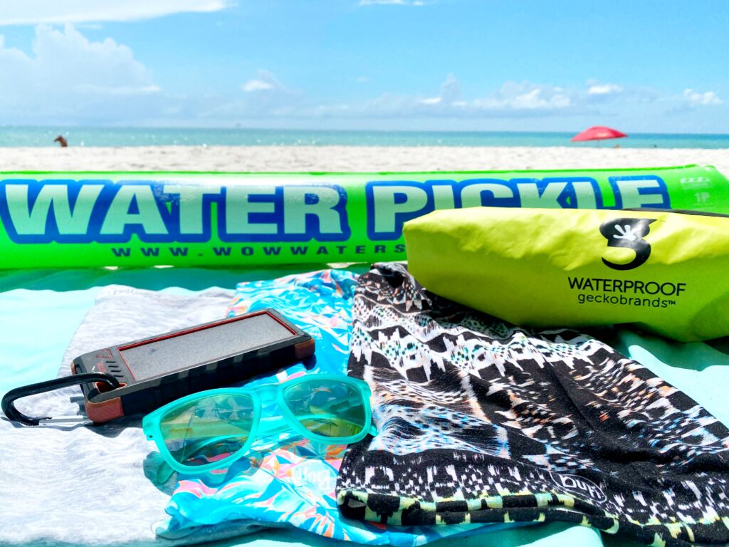 beach float, sunglasses, waterproof bag